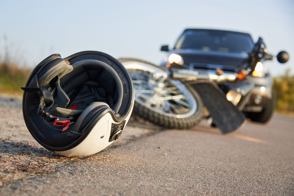 photo of car, helmet and motorcycle on road