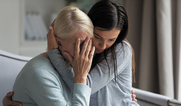 daughter comforting his mother about wrongful death